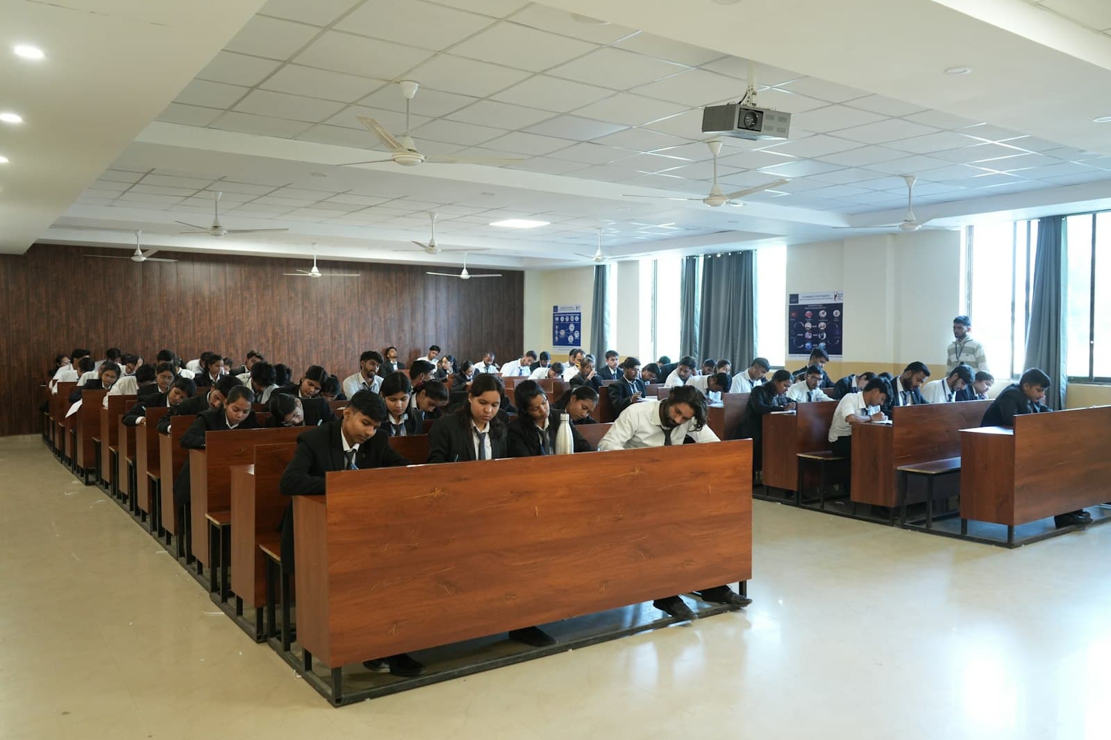 Students attending a lecture in a classroom